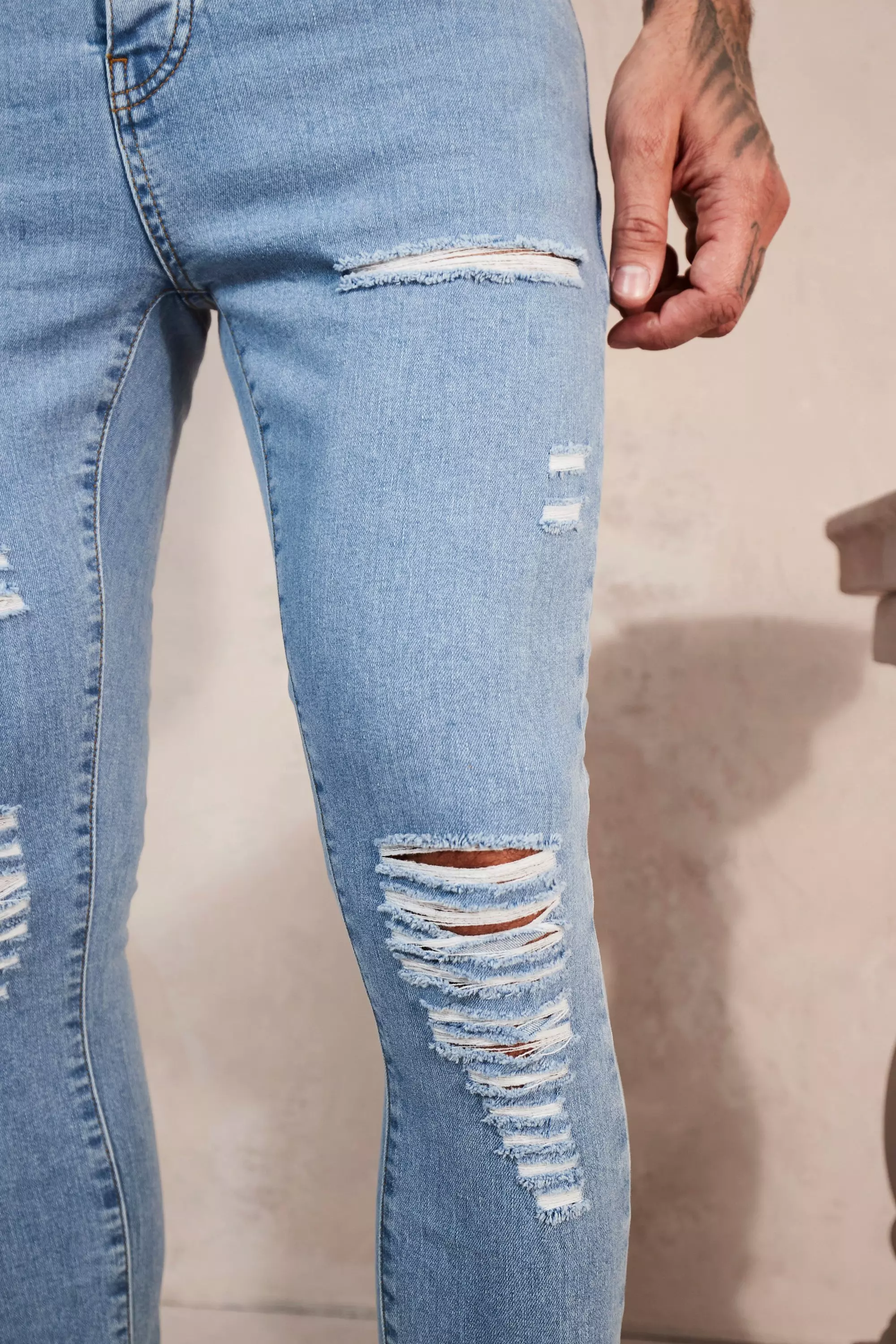 Super Skinny Jeans With All Over Rips | boohooMAN USA